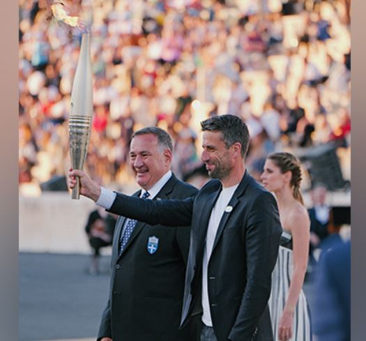 Greece hands over Olympic flame to Paris Games organisers