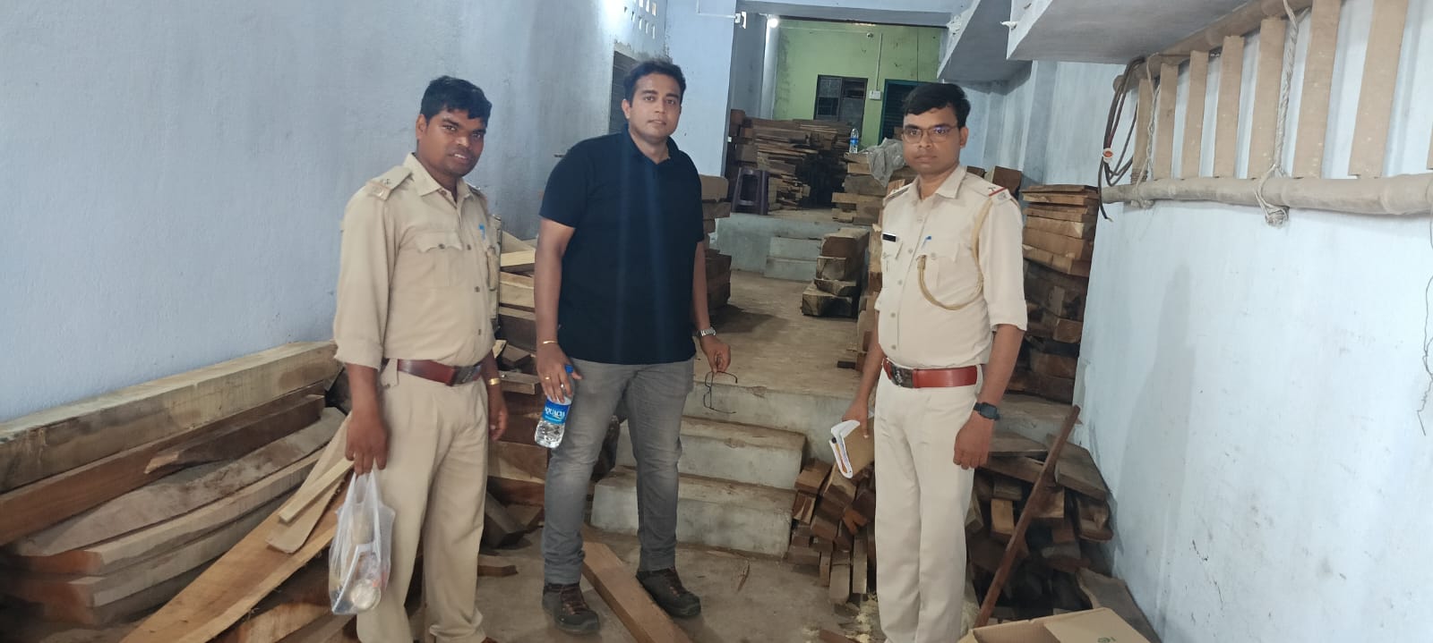 Wood seized during the raid Wood seized during the raid