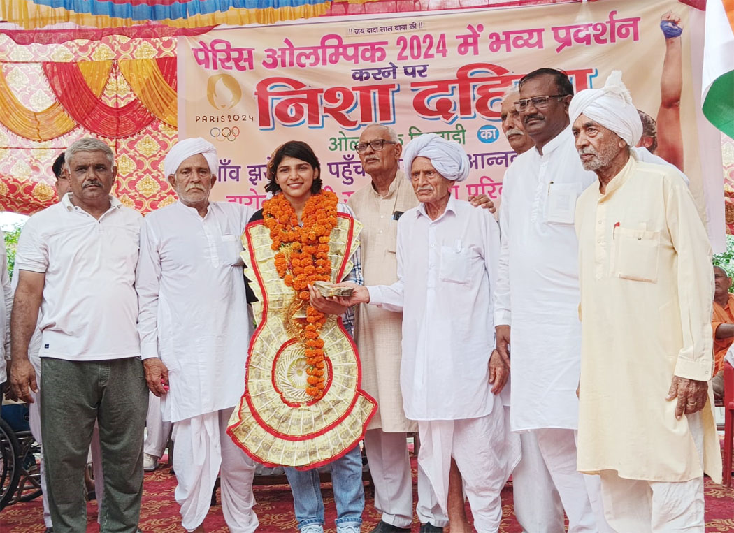 8 Snp- 5 सोनीपत: पहलवान निशा दहिया का स्वागत करते ग्रामीण 8 Snp- 5 सोनीपत: पहलवान निशा दहिया का स्वागत करते ग्रामीण
