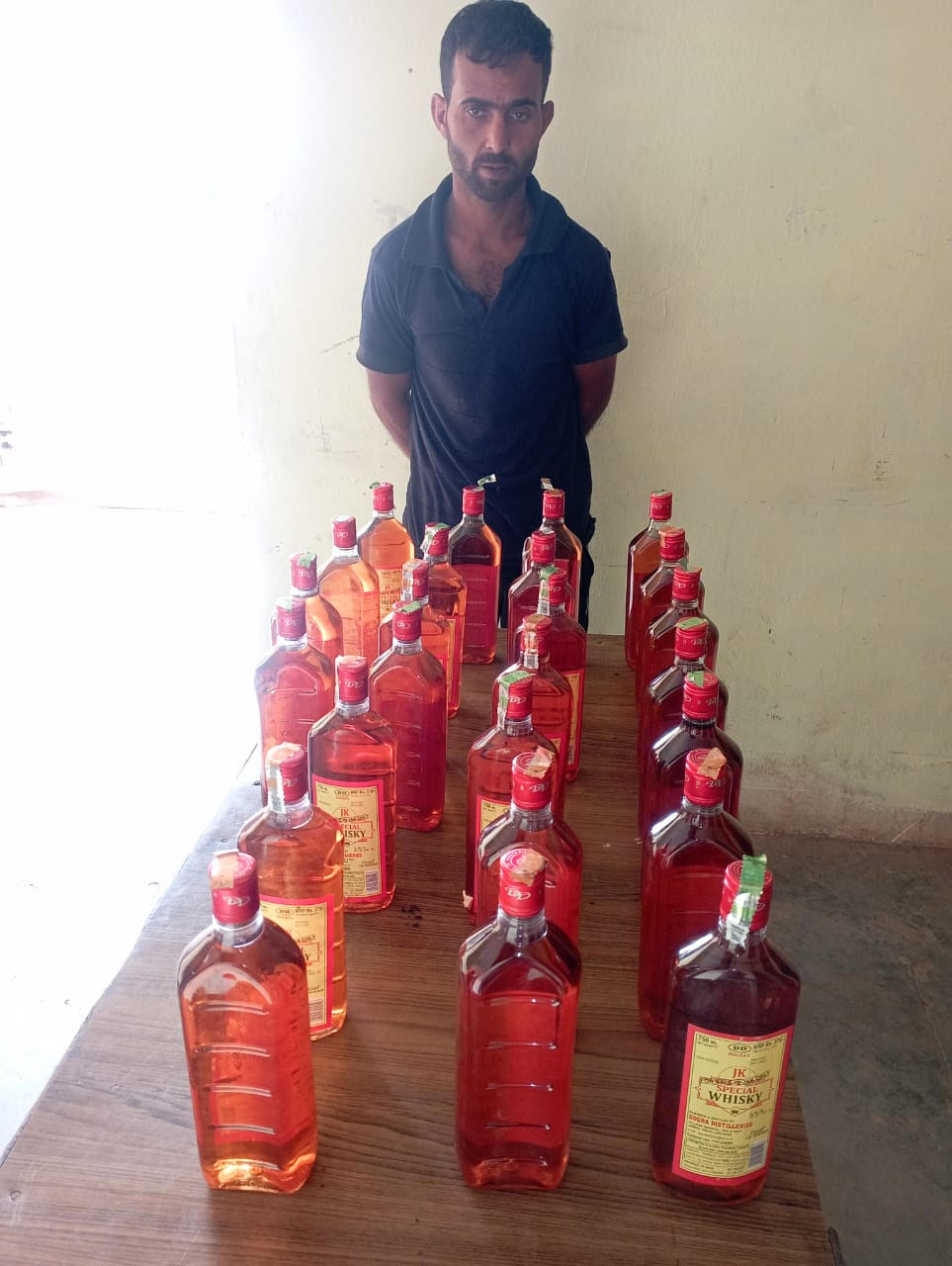 Smuggler arrested with illegal liquor Smuggler arrested with illegal liquor