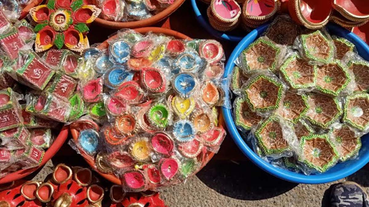 Colourful earthen lamps are ready for sale in the markets of Jaipur Colourful earthen lamps are ready for sale in the markets of Jaipur