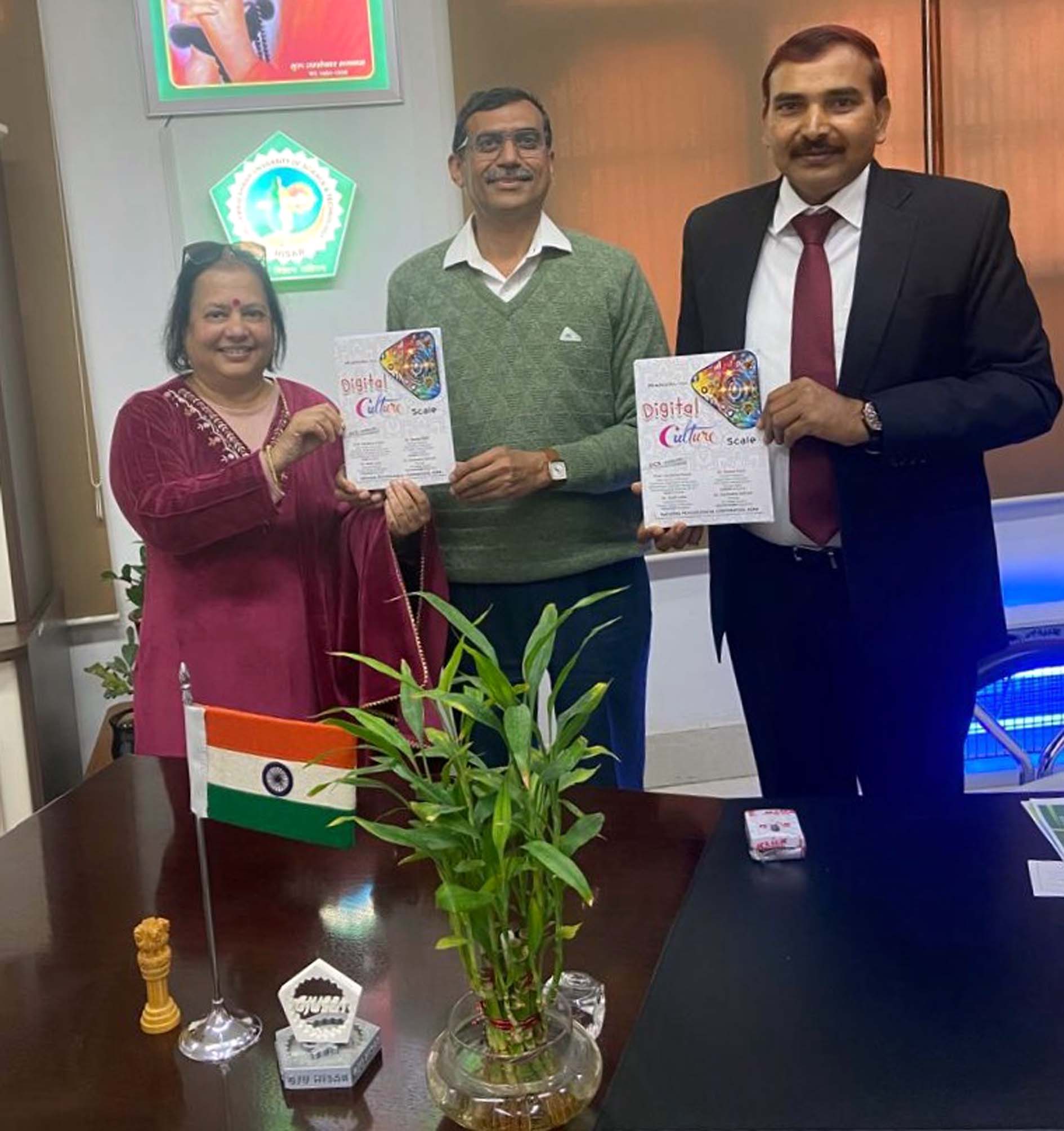 डिजिटल संस्कृति मापन (डीसीएस-पीवीआरआरएलएसएसएस) नामक मनोवैज्ञानिक उपकरण को लांच करते कुलपति प्रो. नरसीराम बिश्नोई, साथ हैं प्रो. संदीप राणा एवं प्रो. वंदना पूनिया। डिजिटल संस्कृति मापन (डीसीएस-पीवीआरआरएलएसएसएस) नामक मनोवैज्ञानिक उपकरण को लांच करते कुलपति प्रो. नरसीराम बिश्नोई, साथ हैं प्रो. संदीप राणा एवं प्रो. वंदना पूनिया।