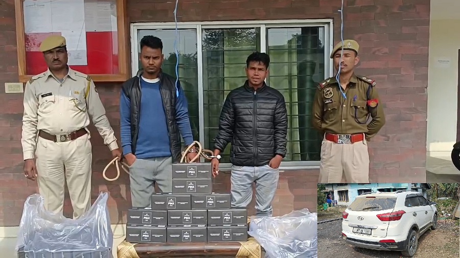 गुवाहाटी की खेत्री पुलिस द्वारा विदेशी सिगरेट के साथ गिरफ्तार किये गये दो तस्करों की तस्वीर। गुवाहाटी की खेत्री पुलिस द्वारा विदेशी सिगरेट के साथ गिरफ्तार किये गये दो तस्करों की तस्वीर।