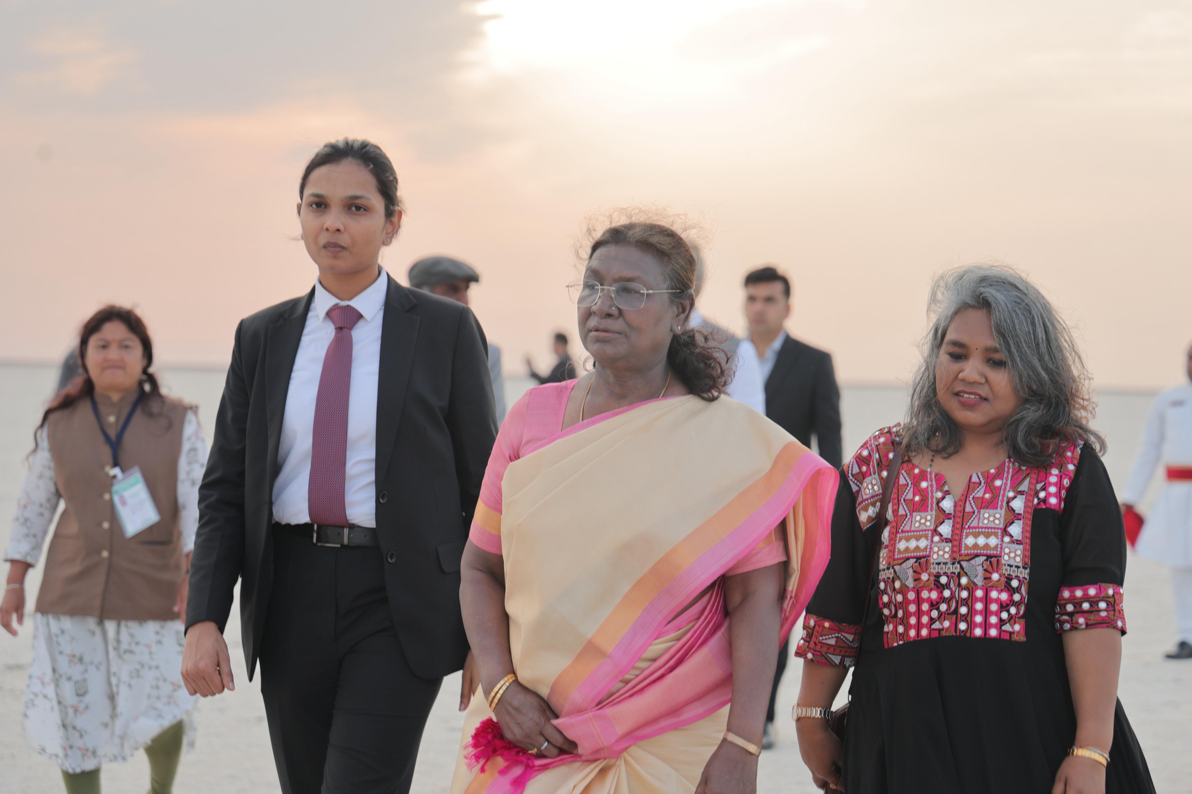 President Draupadi Murmu watching the beautiful sunset in the White Desert of Kutch President Draupadi Murmu watching the beautiful sunset in the White Desert of Kutch