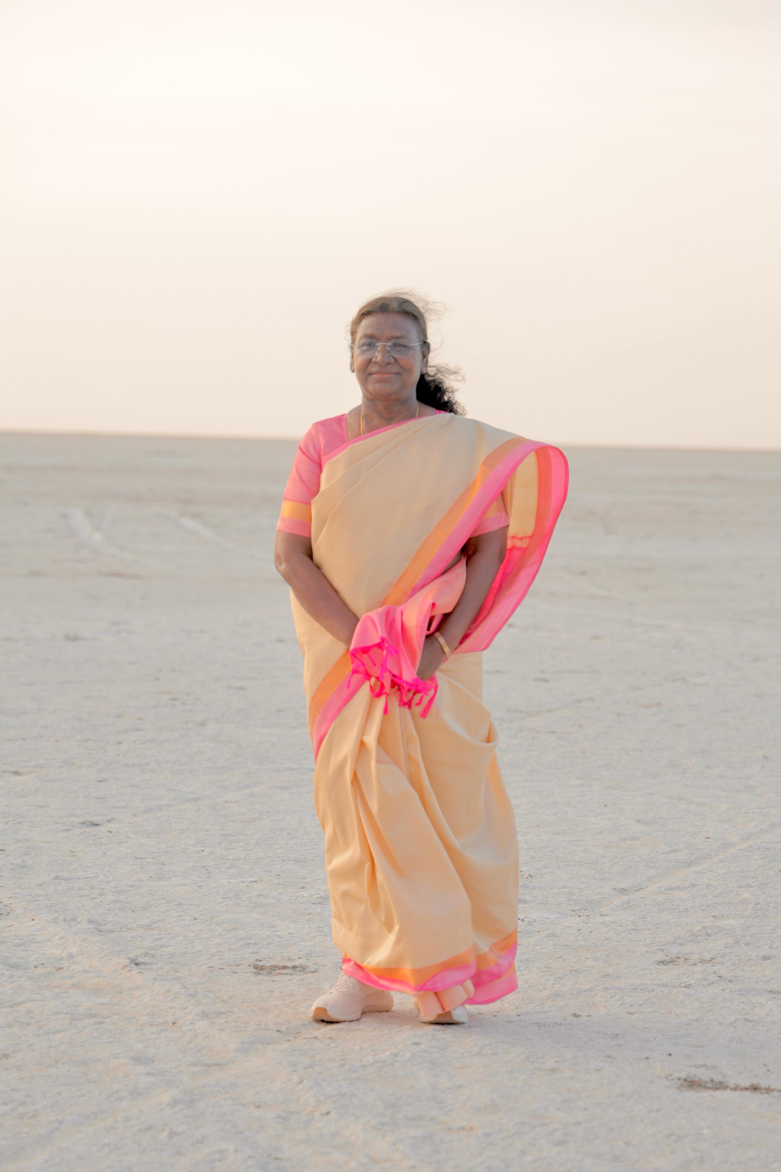 President Draupadi Murmu watching the beautiful sunset in the White Desert of Kutch President Draupadi Murmu watching the beautiful sunset in the White Desert of Kutch