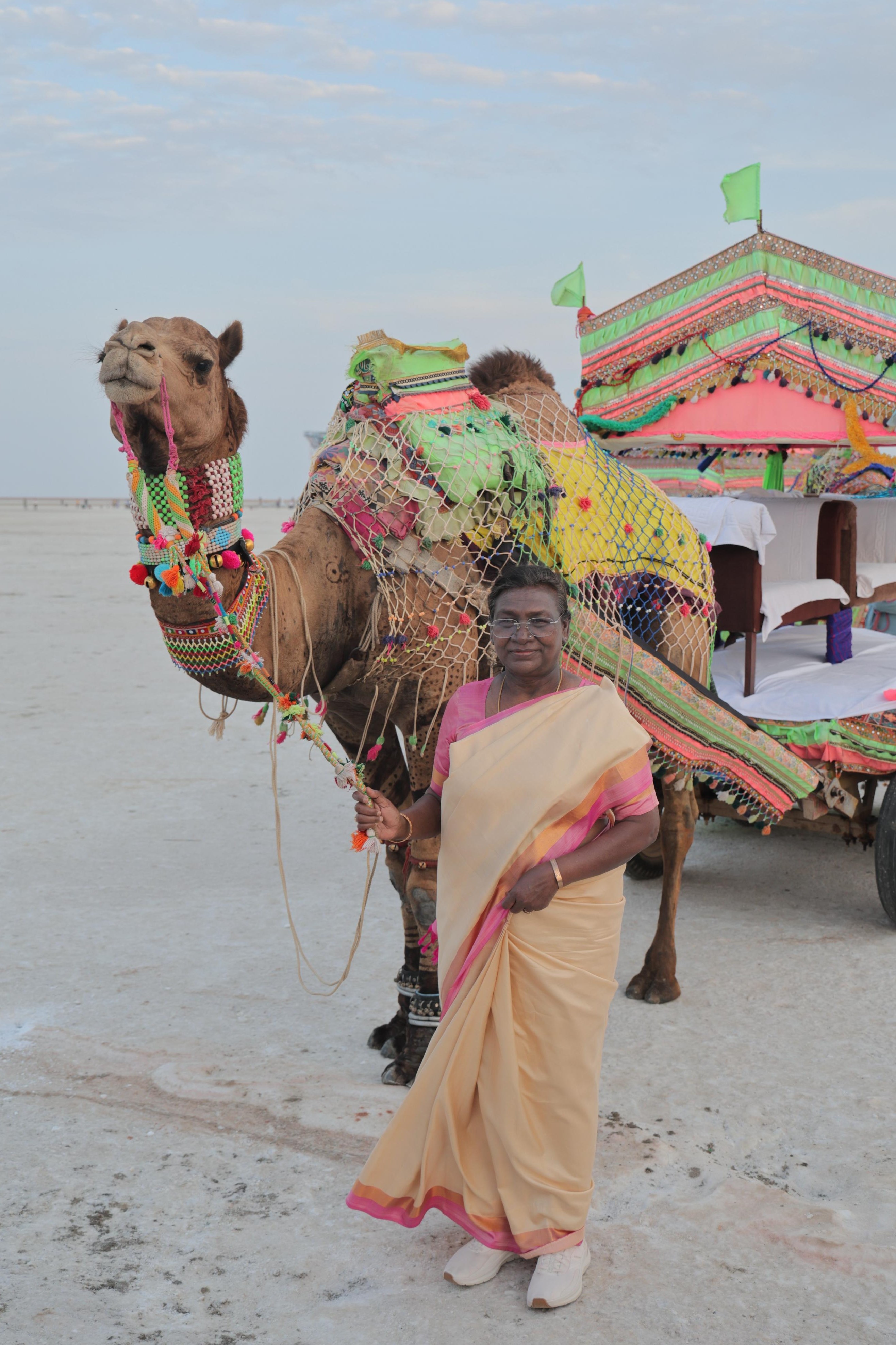President Draupadi Murmu watching the beautiful sunset in the White Desert of Kutch President Draupadi Murmu watching the beautiful sunset in the White Desert of Kutch