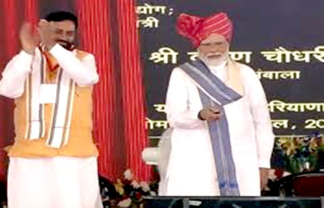 हरियाणा में प्रधानमंत्री परियोजनाओं का उदघाटन करते हुए। हरियाणा में प्रधानमंत्री परियोजनाओं का उदघाटन करते हुए।