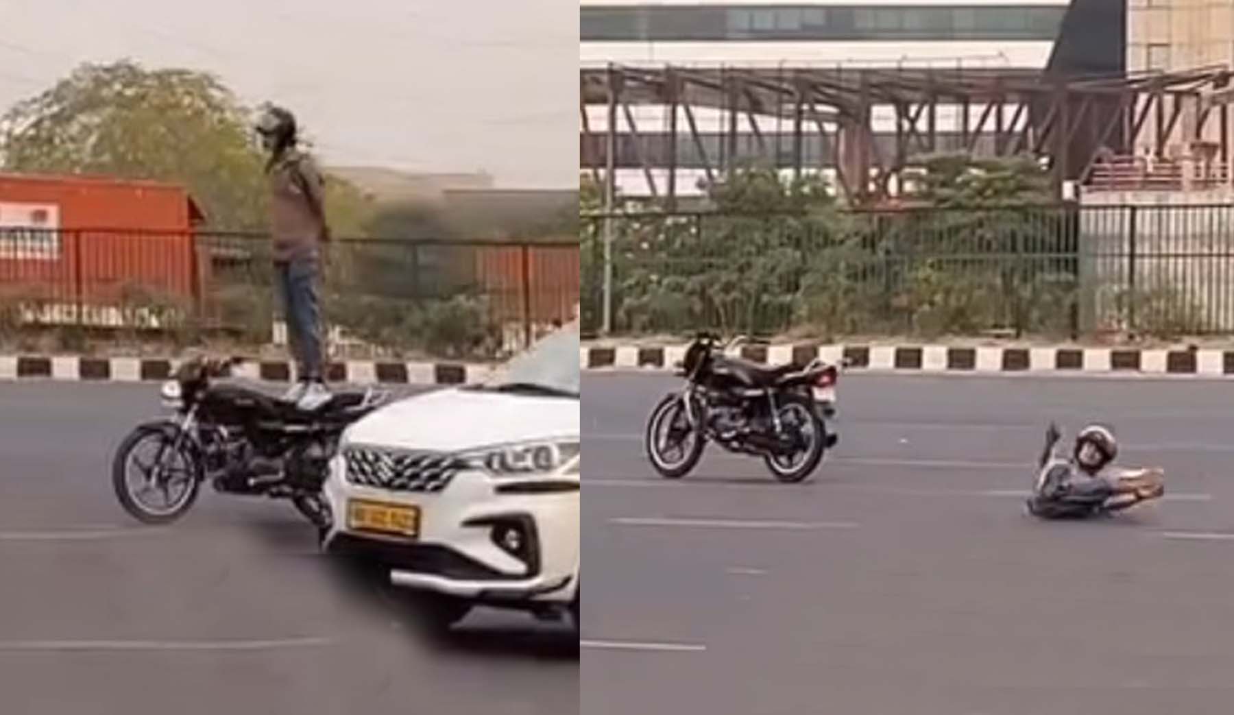 गुरुग्राम-दिल्ली एक्सप्रेस-वे पर बाइक पर स्टंट करता युवक व संतुलन बिगडऩे से सडक़ पर गिरा युवक। गुरुग्राम-दिल्ली एक्सप्रेस-वे पर बाइक पर स्टंट करता युवक व संतुलन बिगडऩे से सडक़ पर गिरा युवक।