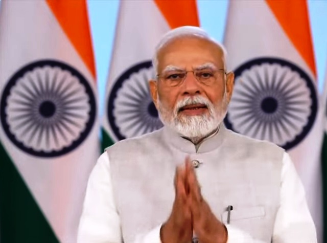 प्रधानमंत्री नरेन्द्र मोदी वीडियो कॉन्फ्रेंसिंग के माध्यम से संबोधित करते हुए प्रधानमंत्री नरेन्द्र मोदी वीडियो कॉन्फ्रेंसिंग के माध्यम से संबोधित करते हुए