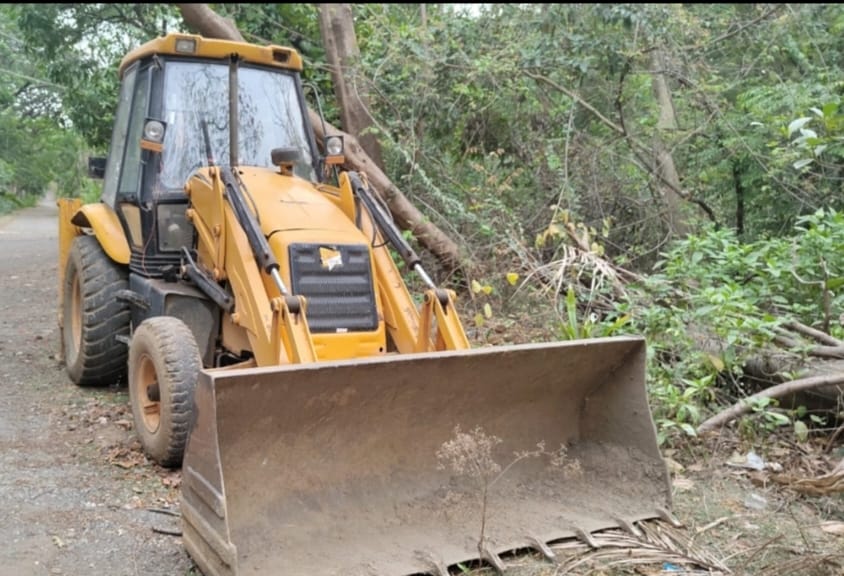 JCB seized filling pond in garden JCB seized filling pond in garden