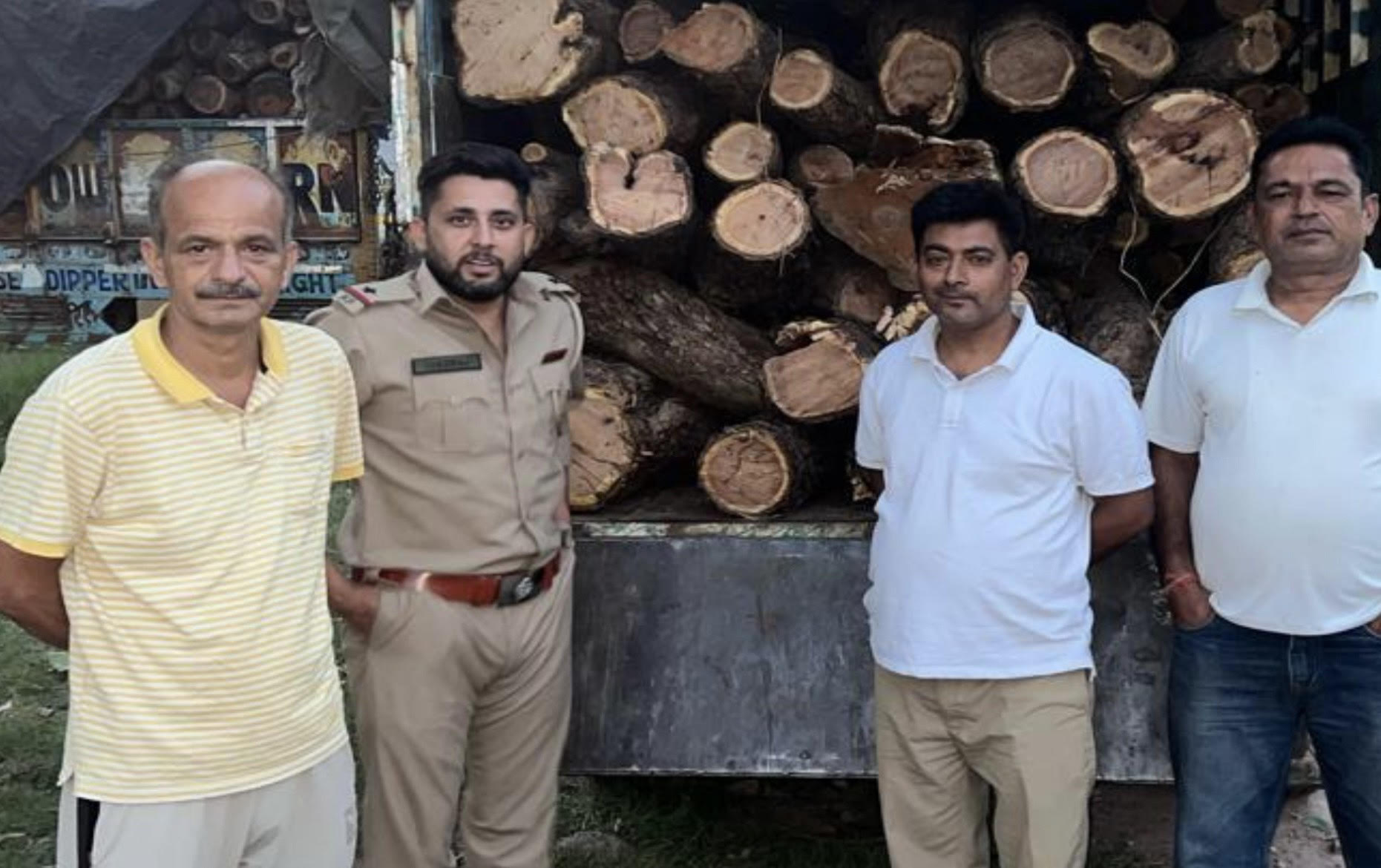 The forest department seized 04 vehicles loaded with khair wood The forest department seized 04 vehicles loaded with khair wood