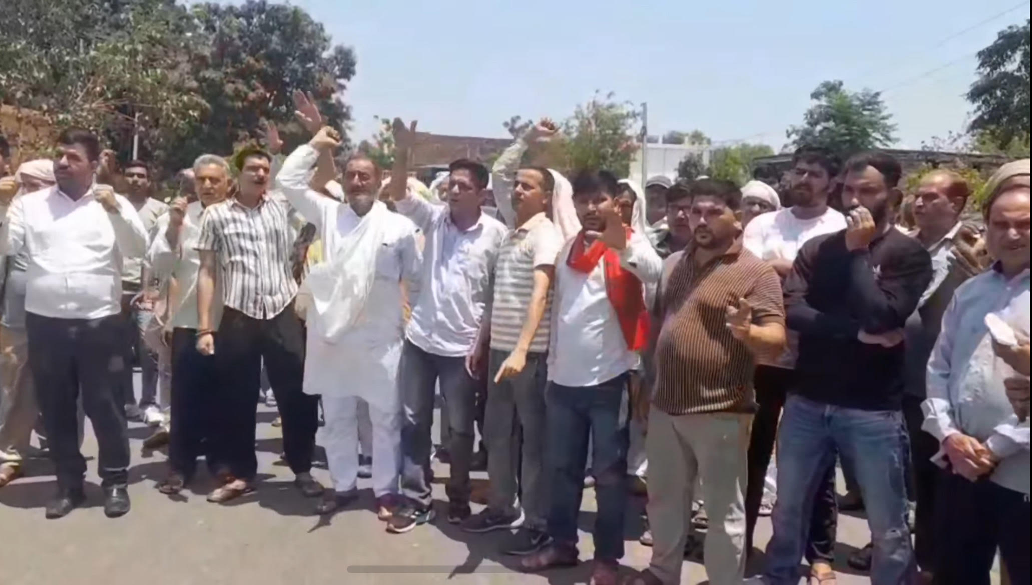 The demand to vacate the water body land from a particular community intensified, protests were held by blocking the road The demand to vacate the water body land from a particular community intensified, protests were held by blocking the road