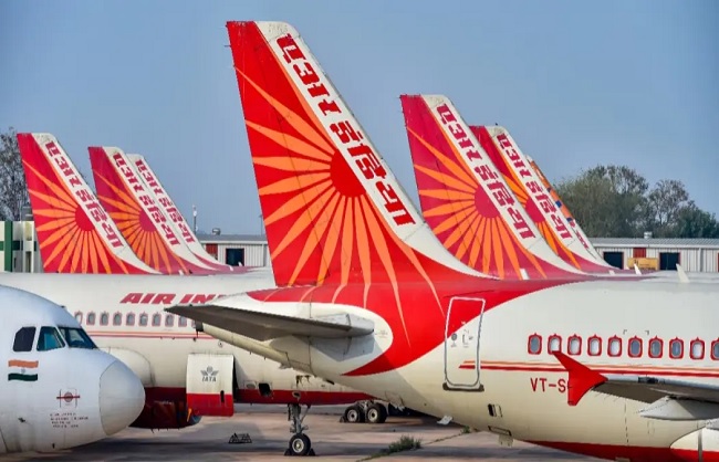 एयर इंडिया के लोगो का प्रतीकात्मक चित्र एयर इंडिया के लोगो का प्रतीकात्मक चित्र