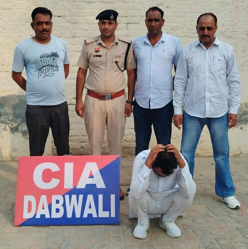 पकड़ा गया अफीम तस्कर। पकड़ा गया अफीम तस्कर।