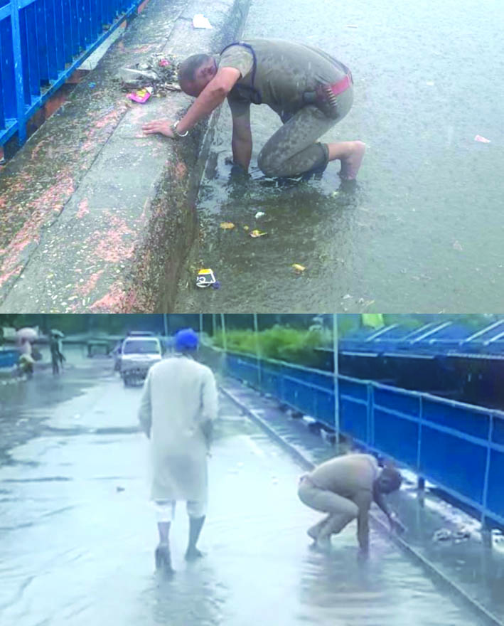 पानी की निकासी करते हुए पानी की निकासी करते हुए