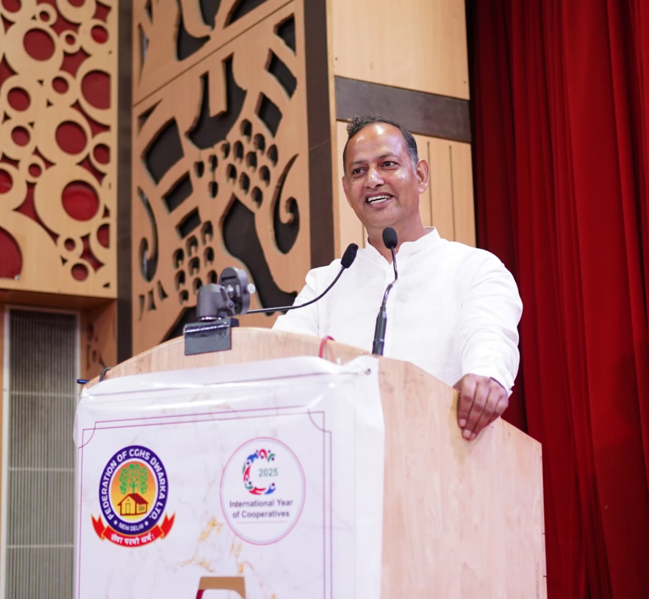 अंतरराष्ट्रीय सहकारिता वर्ष एवं फेडरेशन ऑफ ग्रुप हाउसिंग सोसाइटीज द्वारका के 25 वर्ष पूर्ण होने पर आयोजित कार्यक्रम  को संबोधित करते मंत्री रविंद्र इंद्राज