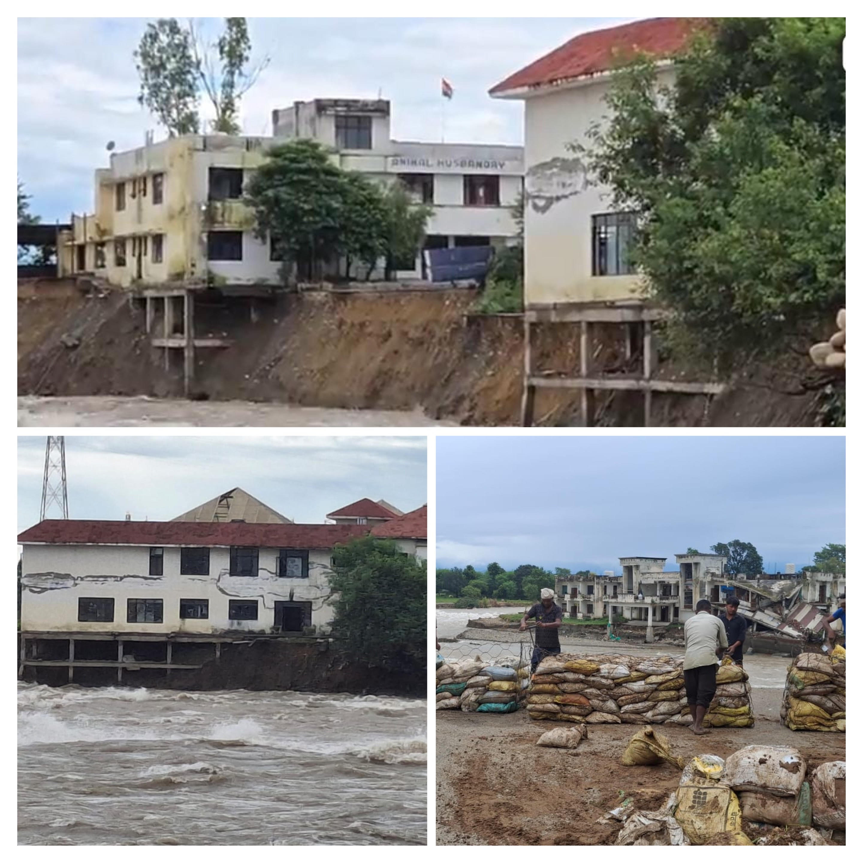 Due to the fast flow of Ravi, land erosion is on the rise, after the old bridge, now the adjacent government buildings are in danger, the foundation of the buildings has become weak Due to the fast flow of Ravi, land erosion is on the rise, after the old bridge, now the adjacent government buildings are in danger, the foundation of the buildings has become weak