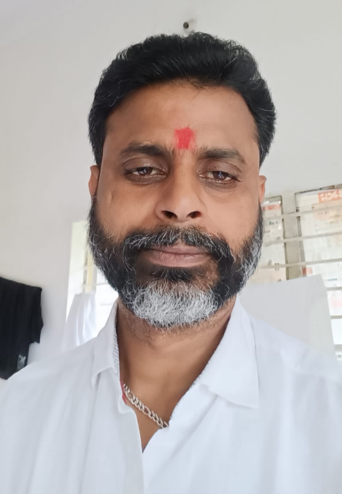 महामंत्री एन.एल. कुमार की तस्वीर