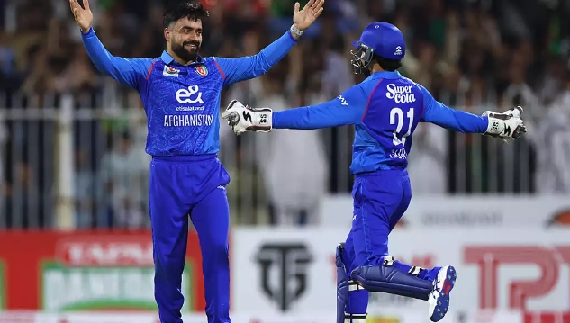 विकेट लेने के बाद खुशी मनाते राशिद खान विकेट लेने के बाद खुशी मनाते राशिद खान