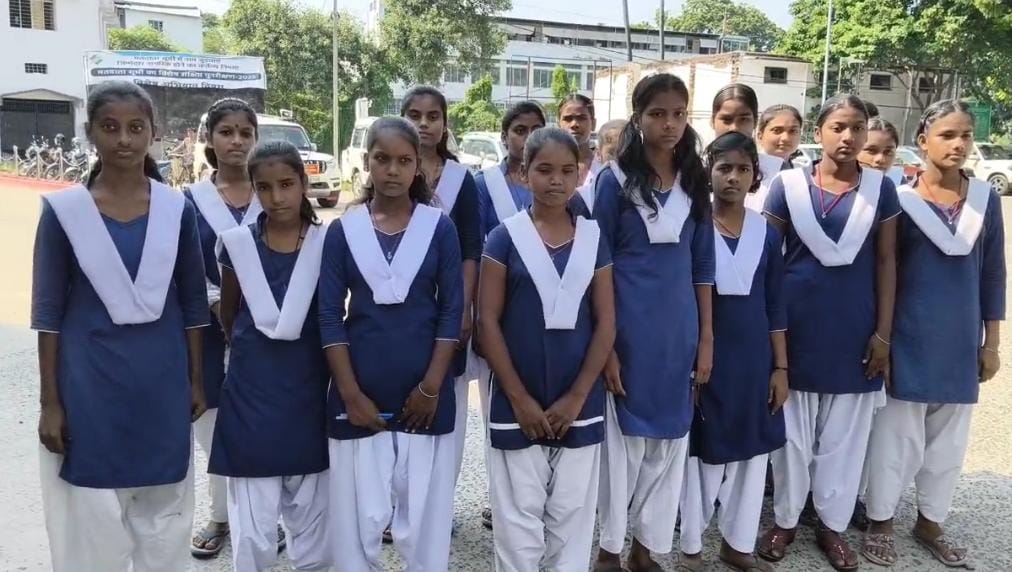 Girls going to meet the District Magistrate Girls going to meet the District Magistrate