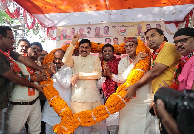 Madhya Pradesh Chief Minister Mohan Yadav along with Sanjay Gupta and others. Madhya Pradesh Chief Minister Mohan Yadav along with Sanjay Gupta and others.