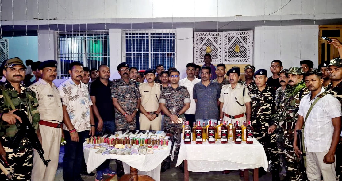 SP with recovered weapons and police team SP with recovered weapons and police team