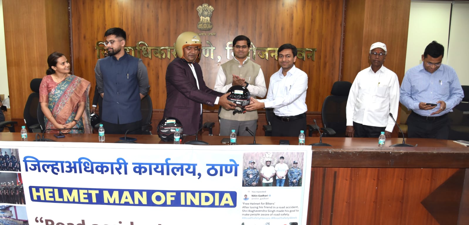 Helmet distributed students Thane DM office