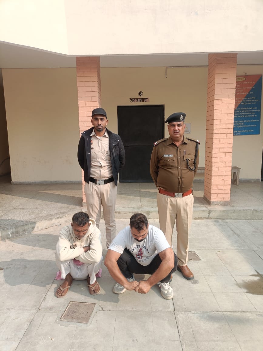 पकड़े गए हेरोइन तस्कर।