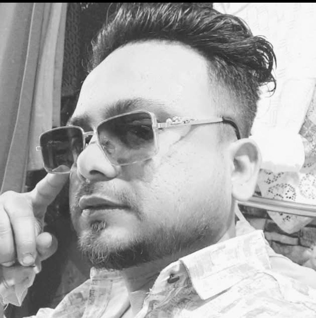 मृतक सद्दाम हुसैन की तस्वीर