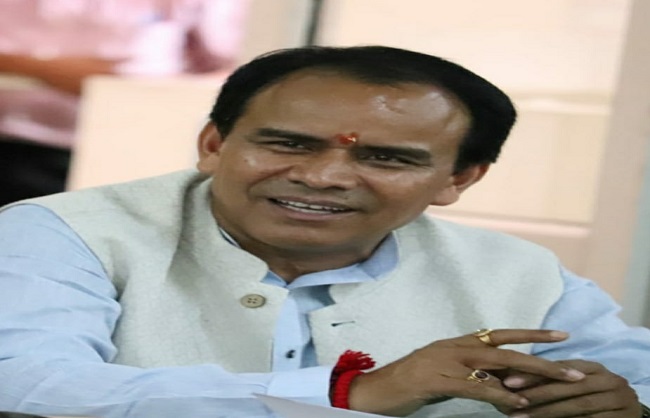 मंत्री धन सिंह रावत.