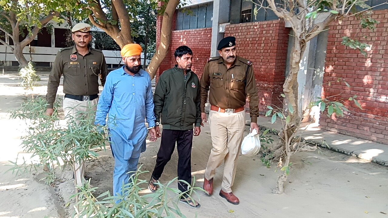 पकड़े गए हेरोइन तस्कर.