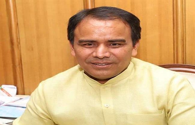मंत्री धन सिंह रावत.