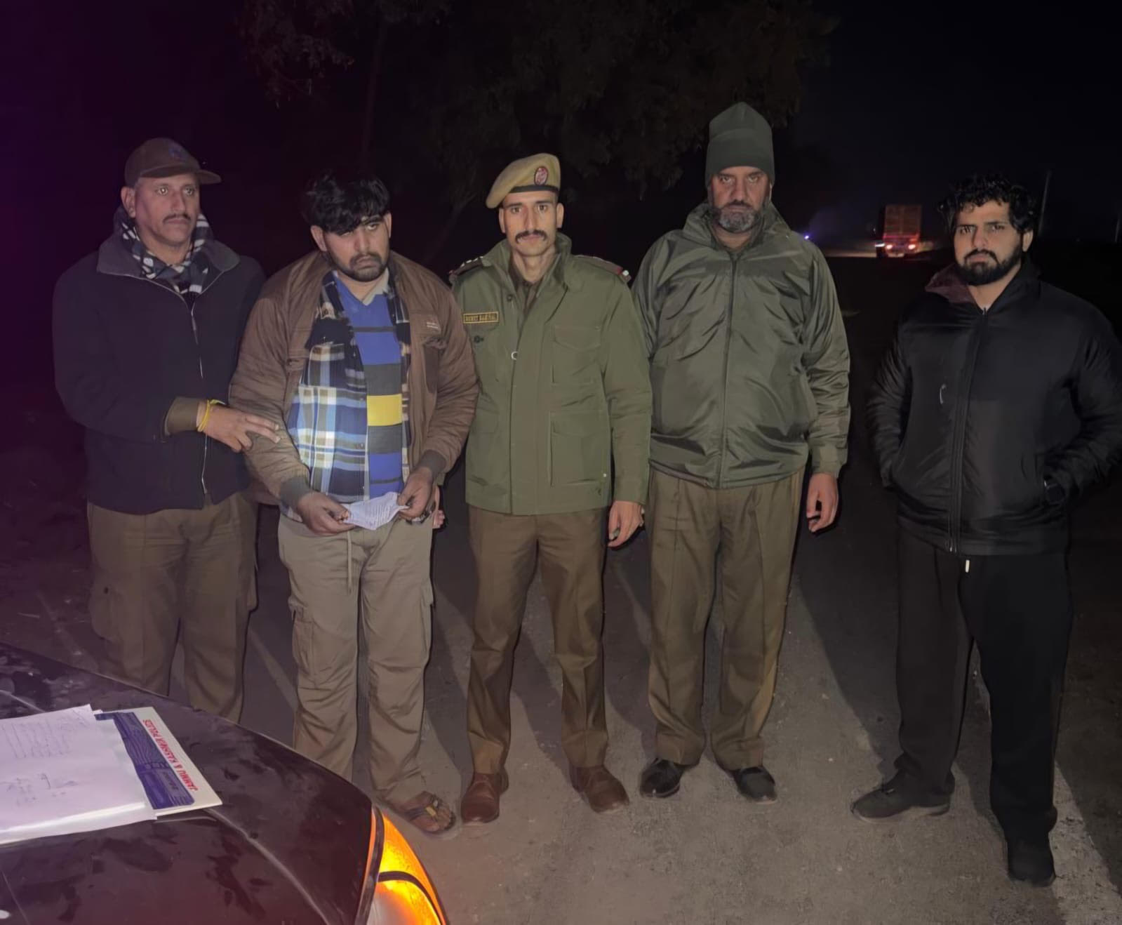 Lakhanpur police arrested a drug smuggler with 12 grams of heroin.