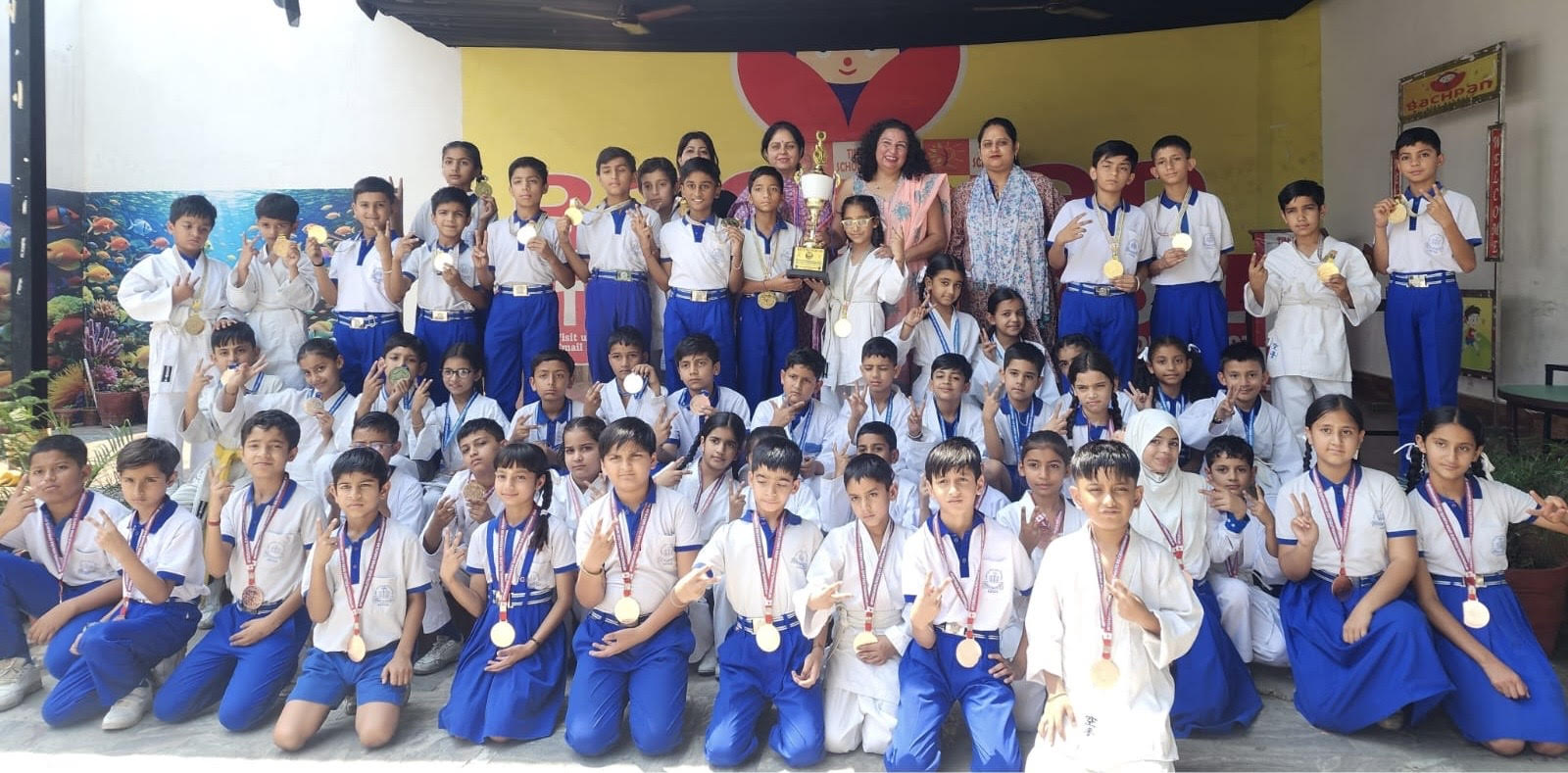 Tiny Scholars School students win Karate Championship trophy with 56 medals