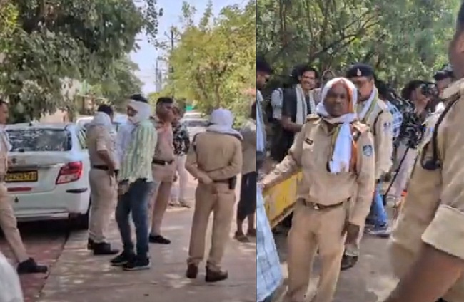 गिरिबाला सिंह के घर के बाहर तैनात पुलिस गिरिबाला सिंह के घर के बाहर तैनात पुलिस