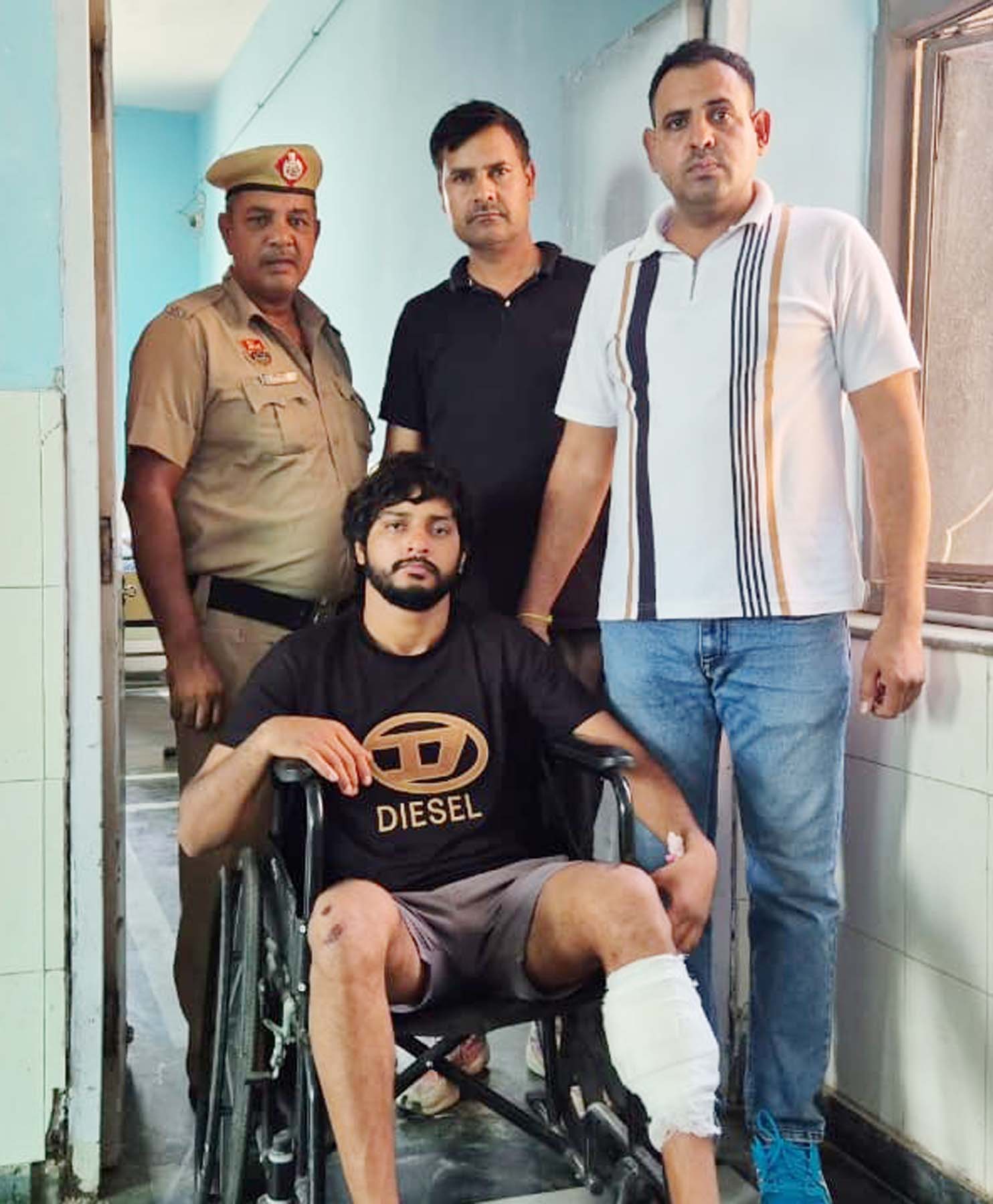 गुरुग्राम पुलिस के साथ मुठभेड़ में पुलिस गिरफ्त में ईनामी बदमाश नितिन।