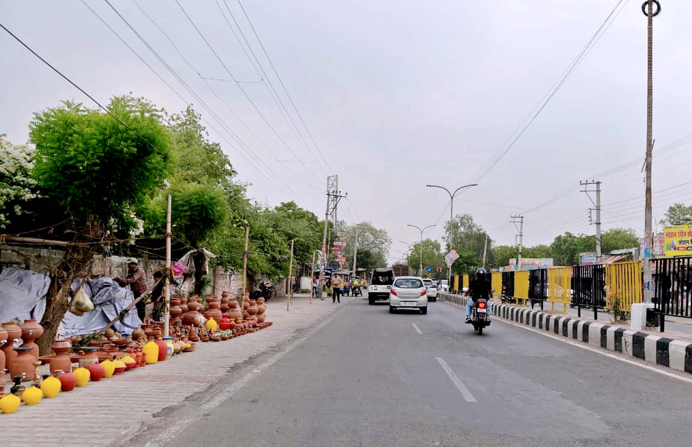 दोपहर के समय खाली नजर आता गोहाना रोड।