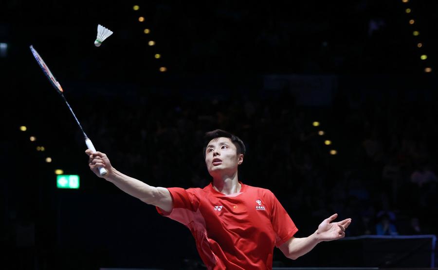 Shi Yuqi hits a return during the men's singles semifinal against Li Shifeng of China at All England Open Badminton Championships 2025 in Birmingham, Britain, March 15, 2025