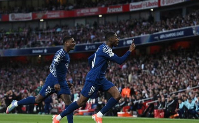 PSG players celebrating after scoring a goal. PSG players celebrating after scoring a goal.