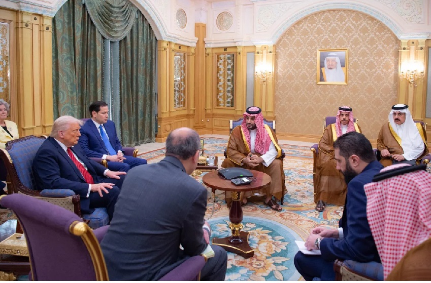 U.S. President Donald Trump meeting with Syrian President Ahmed al-Shara in Riyadh, Saudi Arabia on Wednesday. Photo courtesy - Saudi State TV. U.S. President Donald Trump meeting with Syrian President Ahmed al-Shara in Riyadh, Saudi Arabia on Wednesday. Photo courtesy - Saudi State TV.