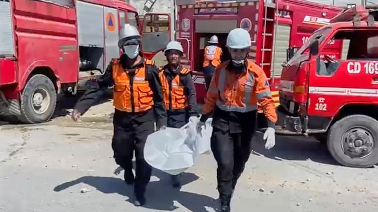 A strike in Khan Younis killed nine of a doctor's ten children while she worked, as reported by Ahmad al-Farra from Nasser Hospital. A strike in Khan Younis killed nine of a doctor's ten children while she worked, as reported by Ahmad al-Farra from Nasser Hospital.