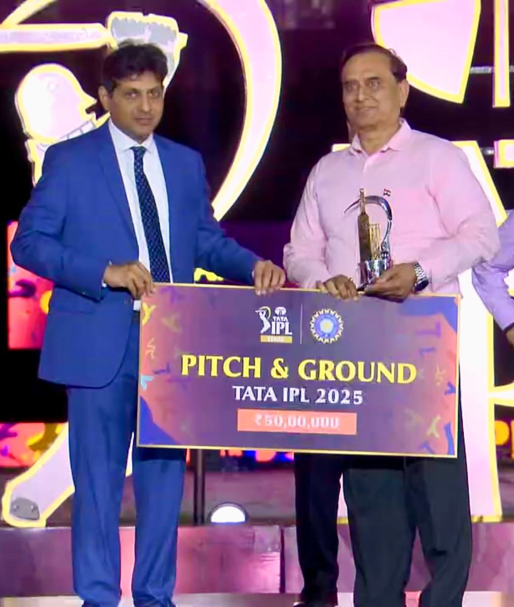 Secretary Ashok Sharma receiving the award.