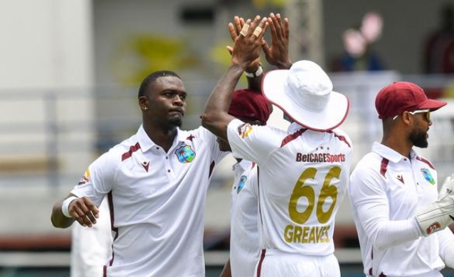 West Indies players celebrate the joy of taking a wicket. West Indies players celebrate the joy of taking a wicket.