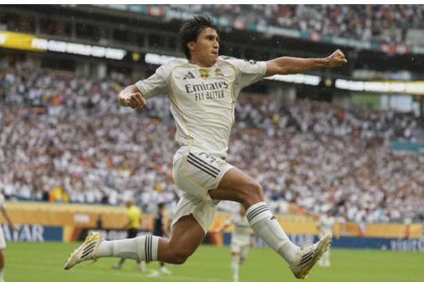 Gonzalo García celebrating after scoring a goal. Gonzalo García celebrating after scoring a goal.