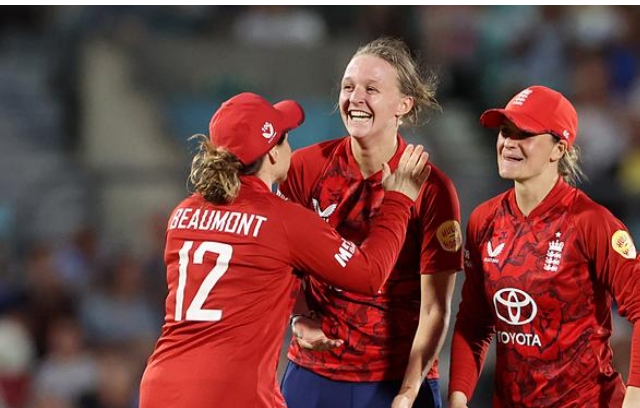 England's player celebrating after taking a wicket. England's player celebrating after taking a wicket.