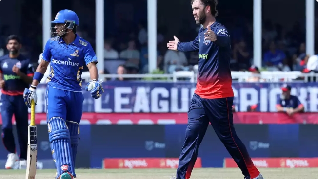 Glenn Maxwell celebrating after taking a wicket.