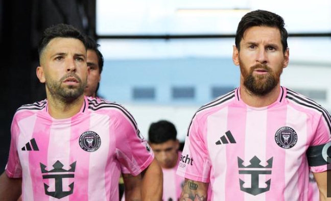 Lionel Messi and Jordi Alba
