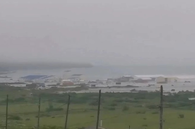 The geophysical service of the Russian Academy of Sciences has released a video of the tsunami that hit the coastal area of Severo-Kurilsk on Paramushir Island in the Kuril Islands. This image is prepared from the same video.