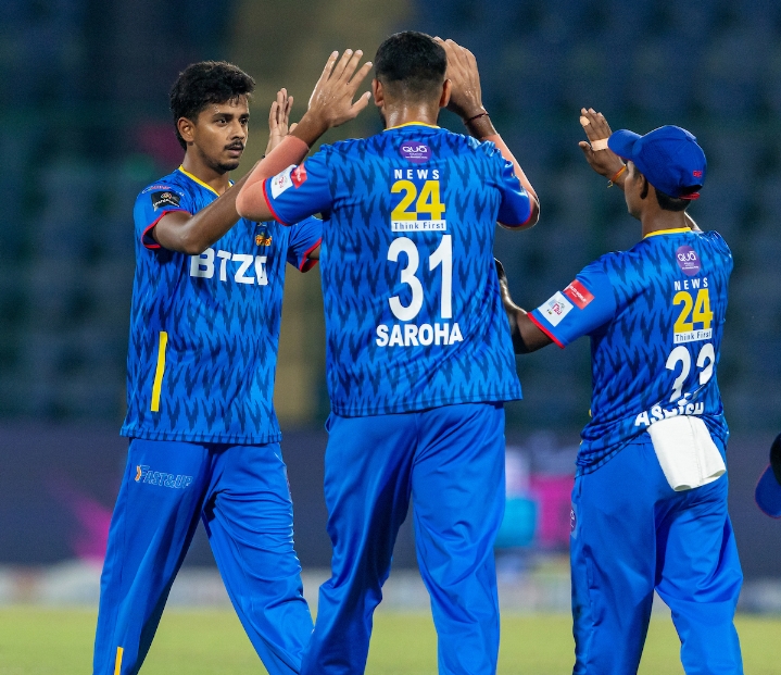 Central Delhi team celebrating after taking a wicket.