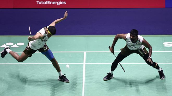 India’s Satwiksairaj Rankireddy (R) and Chirag Shetty play against China’s Liu Yi and China’s Chen Boyang in the men’s double semifinal match at the Badminton BWF World Championships. India’s Satwiksairaj Rankireddy (R) and Chirag Shetty play against China’s Liu Yi and China’s Chen Boyang in the men’s double semifinal match at the Badminton BWF World Championships.